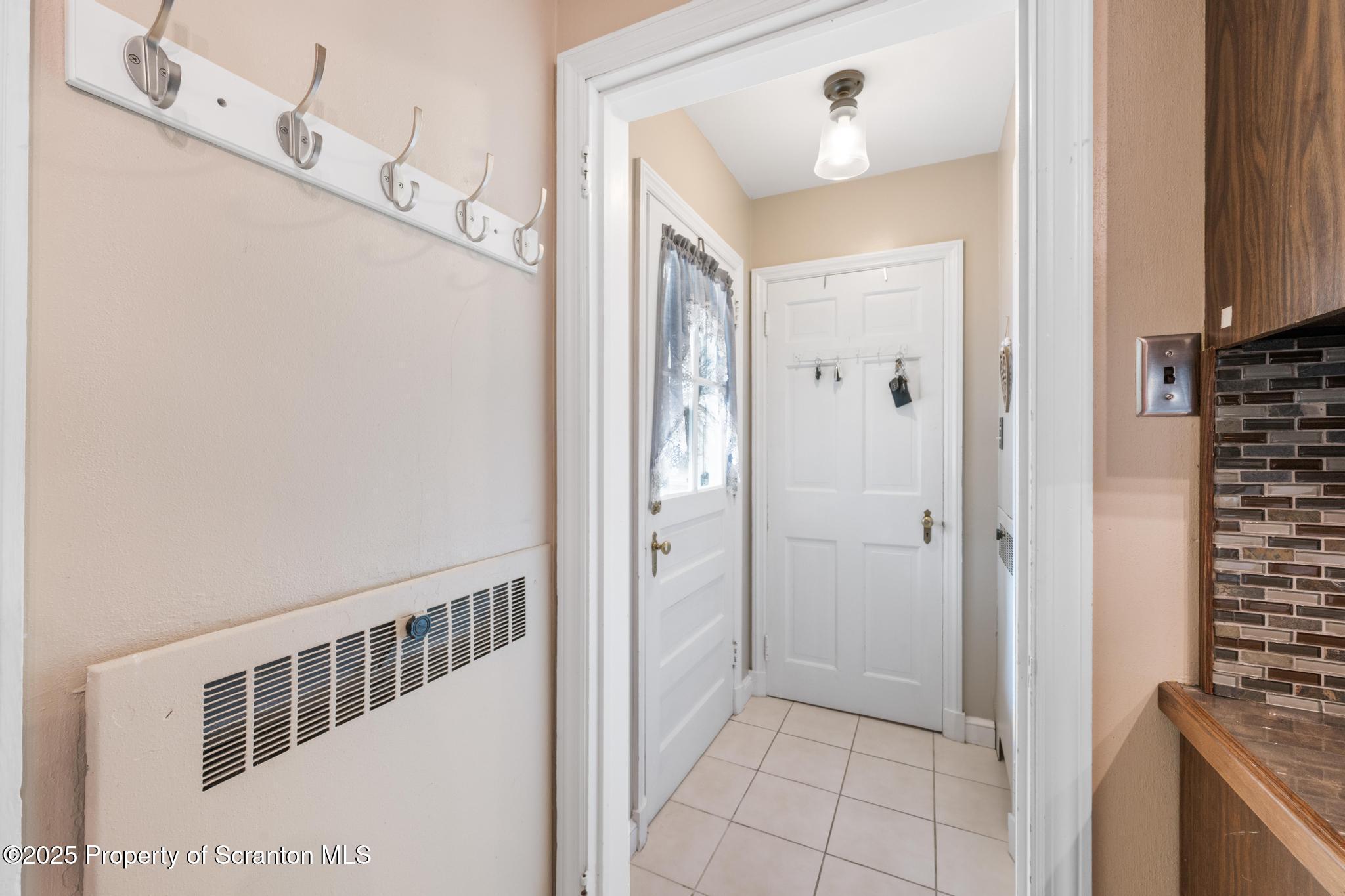 114 Spring Street Clarks Green, PA 18411 - Photo 14 of 47 a view of a hallway with a white walls