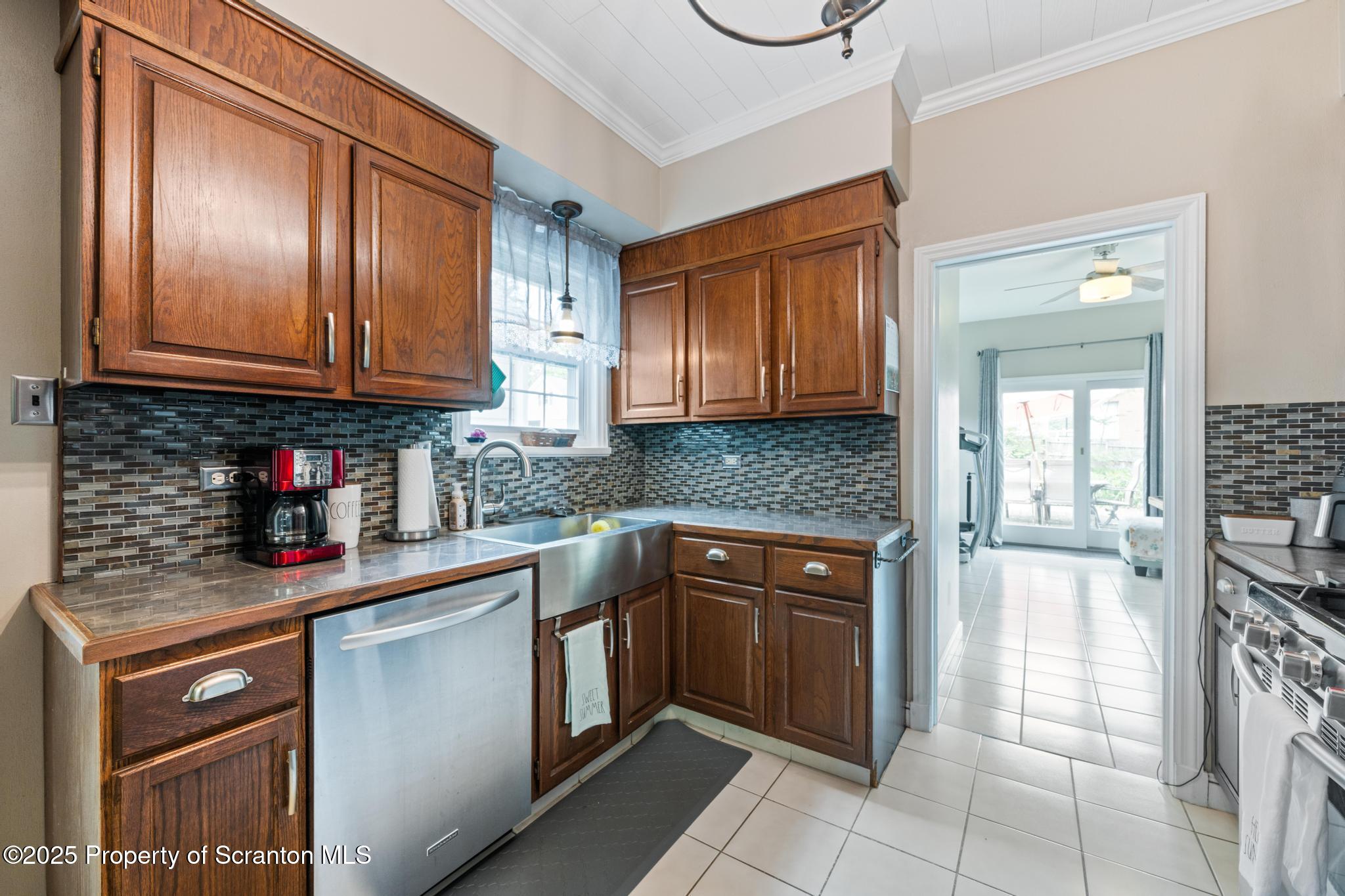 114 Spring Street Clarks Green, PA 18411 - Photo 15 of 47 a kitchen with granite countertop stainless steel appliances and cabinets