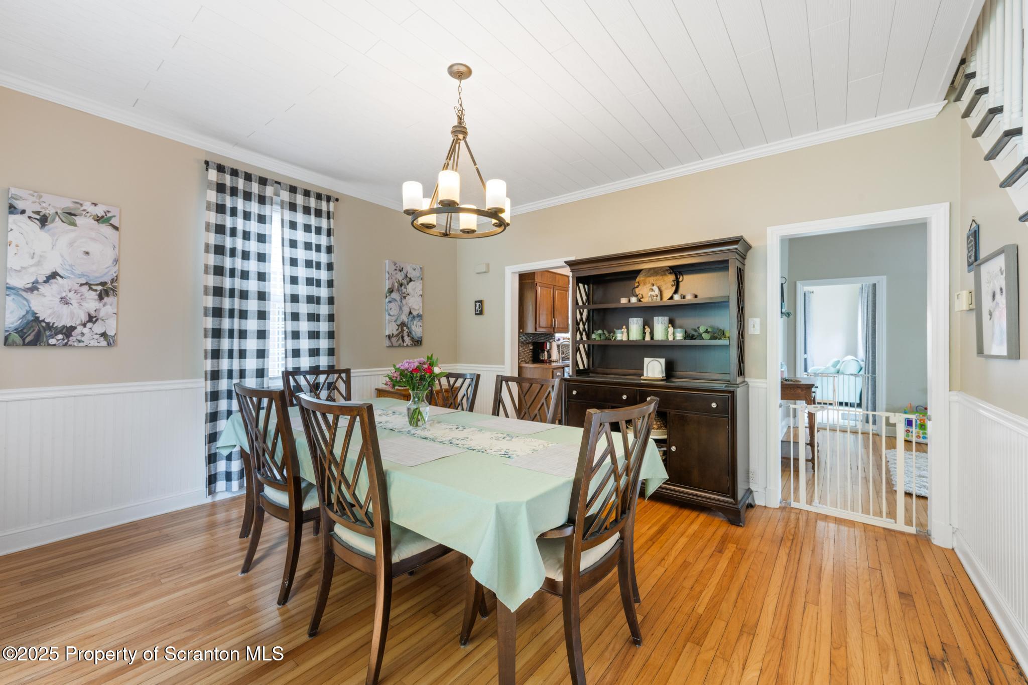 114 Spring Street Clarks Green, PA 18411 - Photo 20 of 47 a view of a dining room with furniture and wooden floor