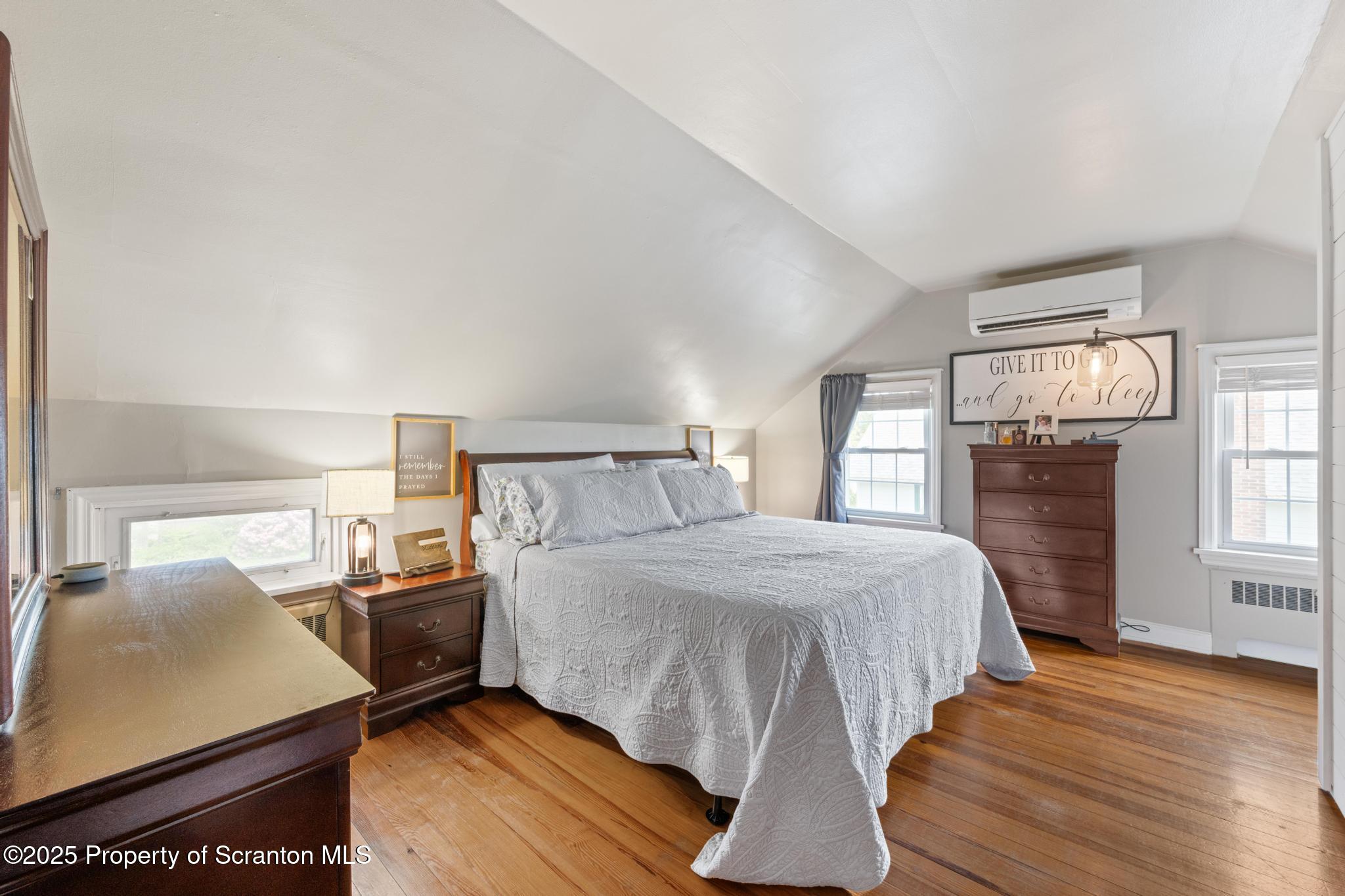 114 Spring Street Clarks Green, PA 18411 - Photo 24 of 47 a bedroom with a bed and wooden floor