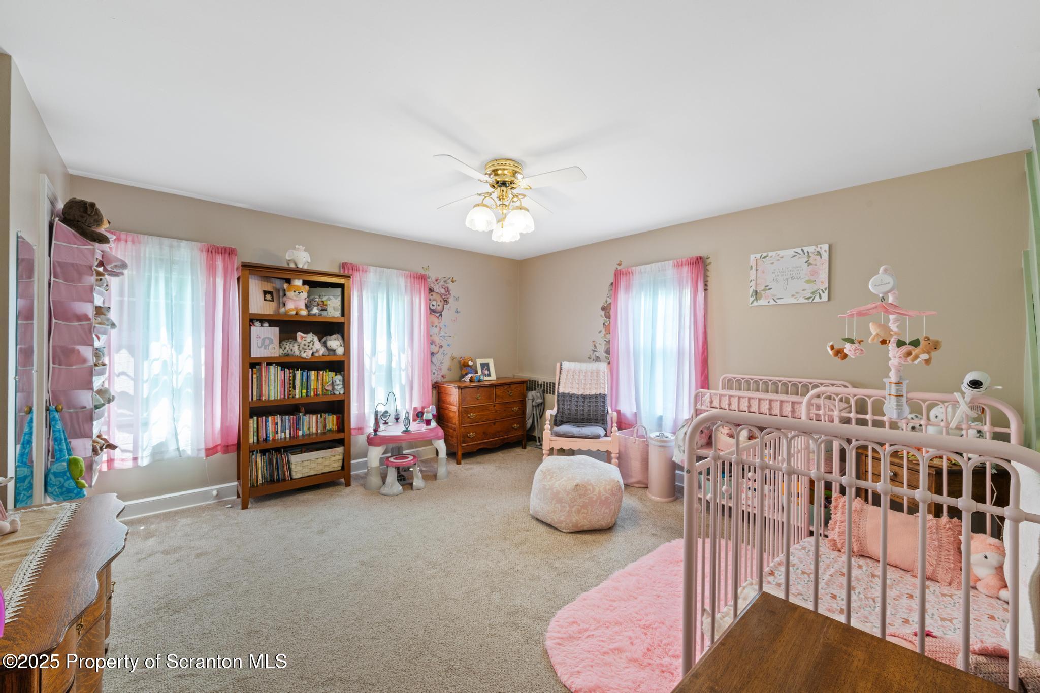 114 Spring Street Clarks Green, PA 18411 - Photo 29 of 47 a bedroom with furniture and a large window