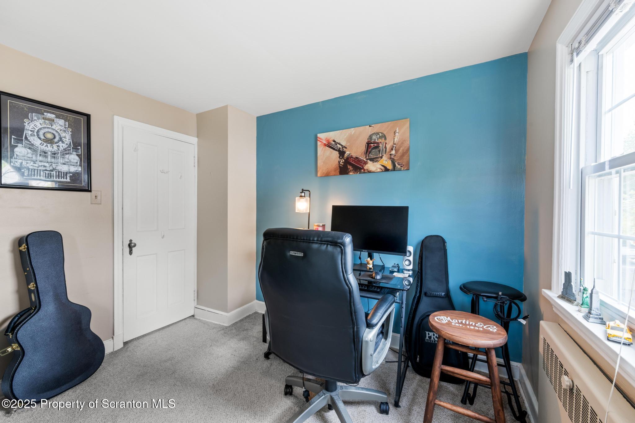 114 Spring Street Clarks Green, PA 18411 - Photo 34 of 47 a work room with furniture and a window