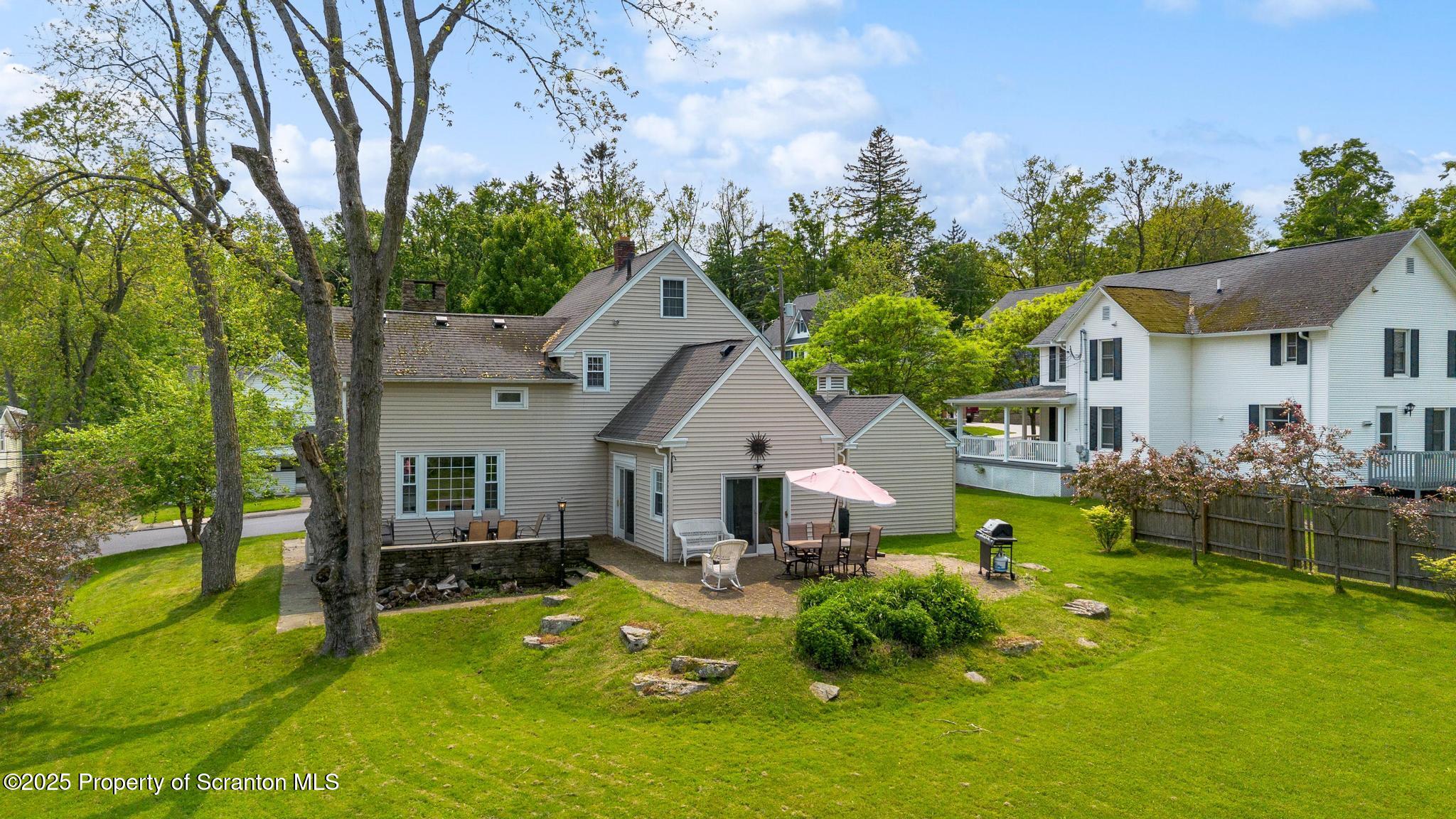 114 Spring Street Clarks Green, PA 18411 - Photo 37 of 47 a front view of a house with yard and green space