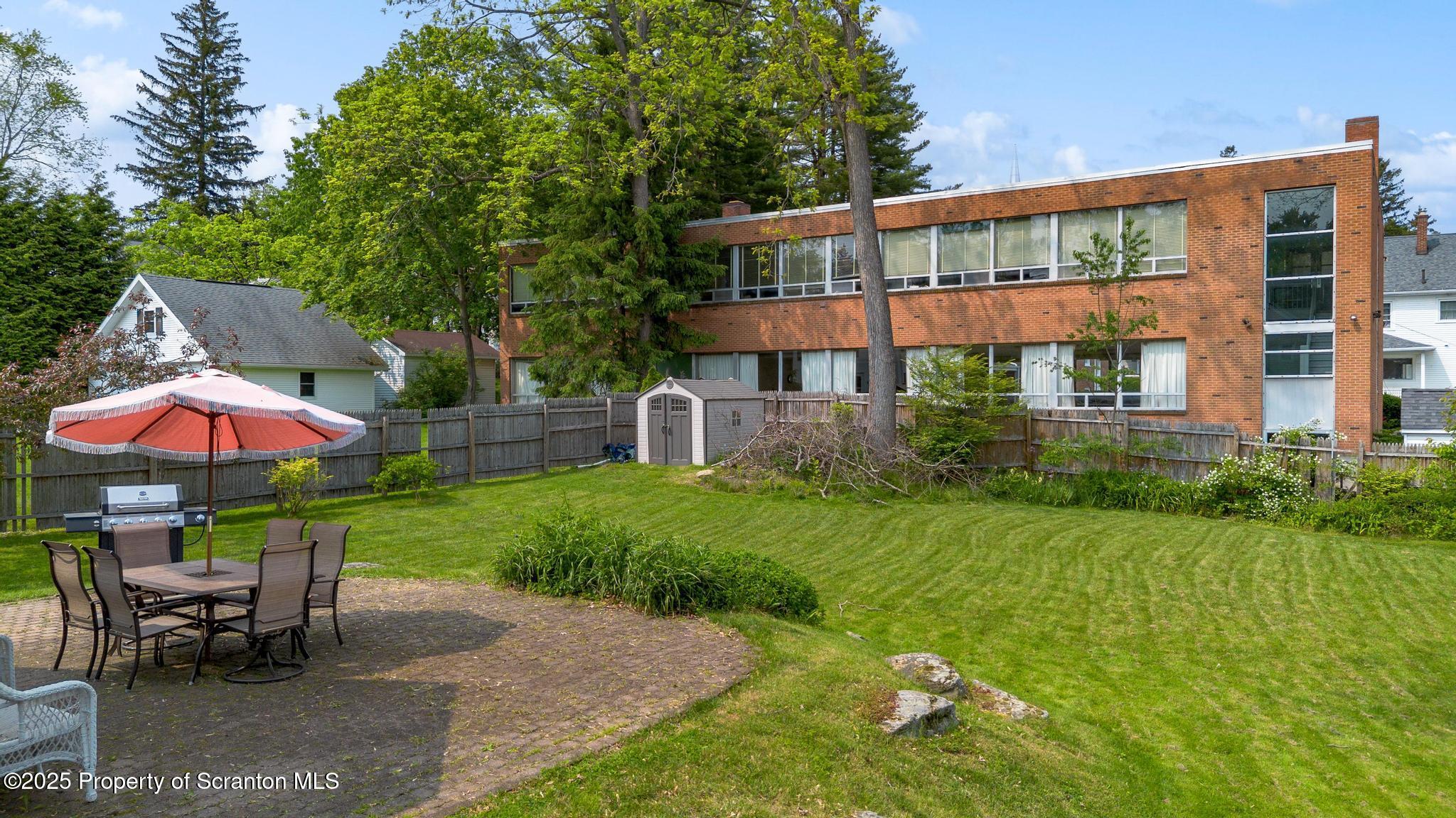 114 Spring Street Clarks Green, PA 18411 - Photo 42 of 47 a view of a house with backyard porch and sitting area
