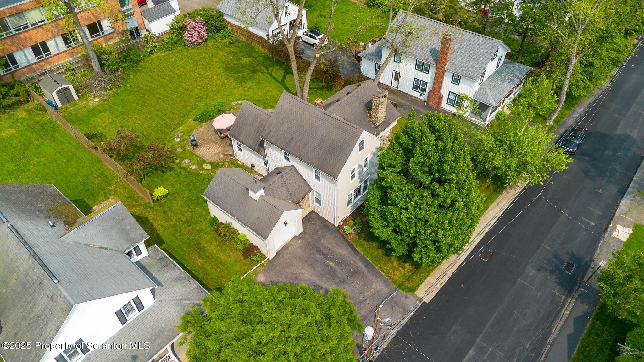 114 Spring Street Clarks Green, PA 18411 - Photo 44 of 47 an aerial view of a house with a garden