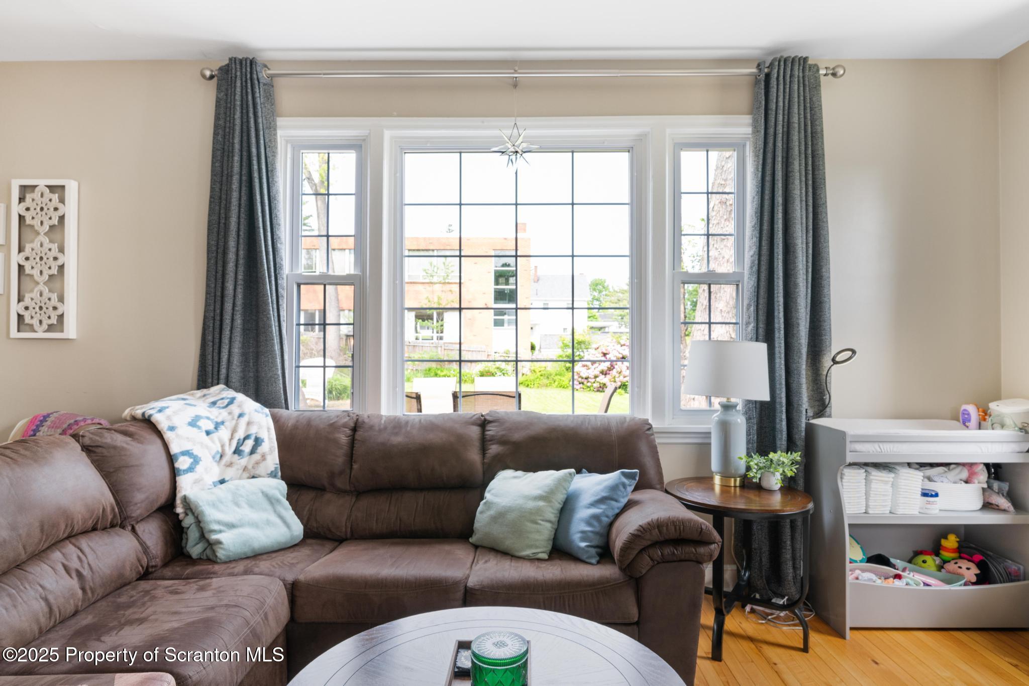 114 Spring Street Clarks Green, PA 18411 - Photo 6 of 47 a living room with furniture and a large window