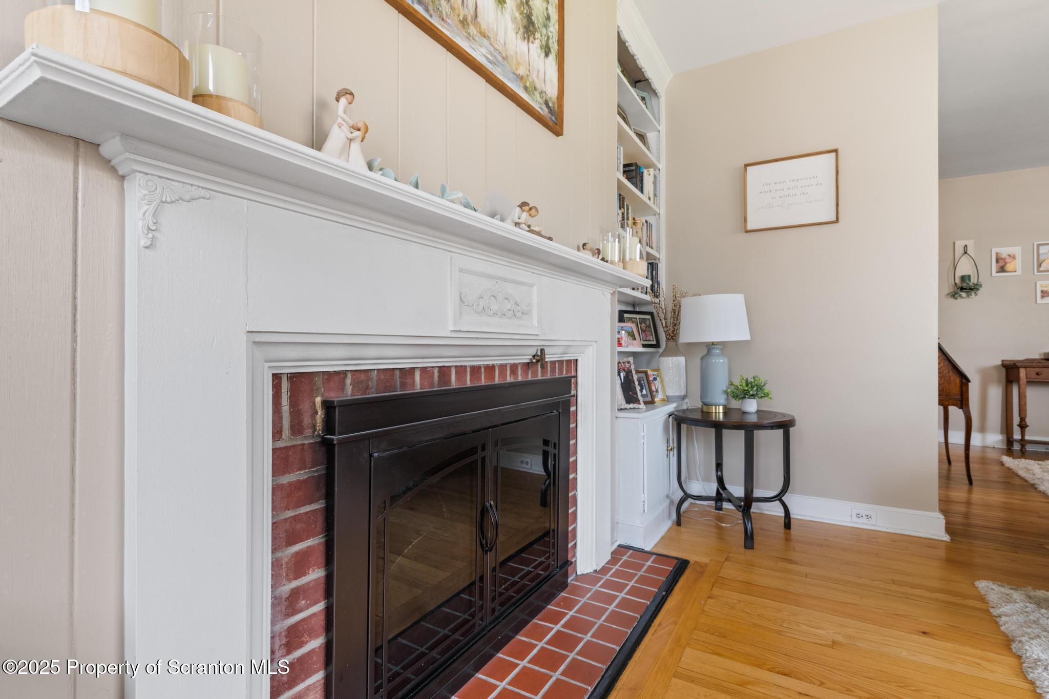 114 Spring Street Clarks Green, PA 18411 - Photo 9 of 47 a living room with furniture and a fireplace