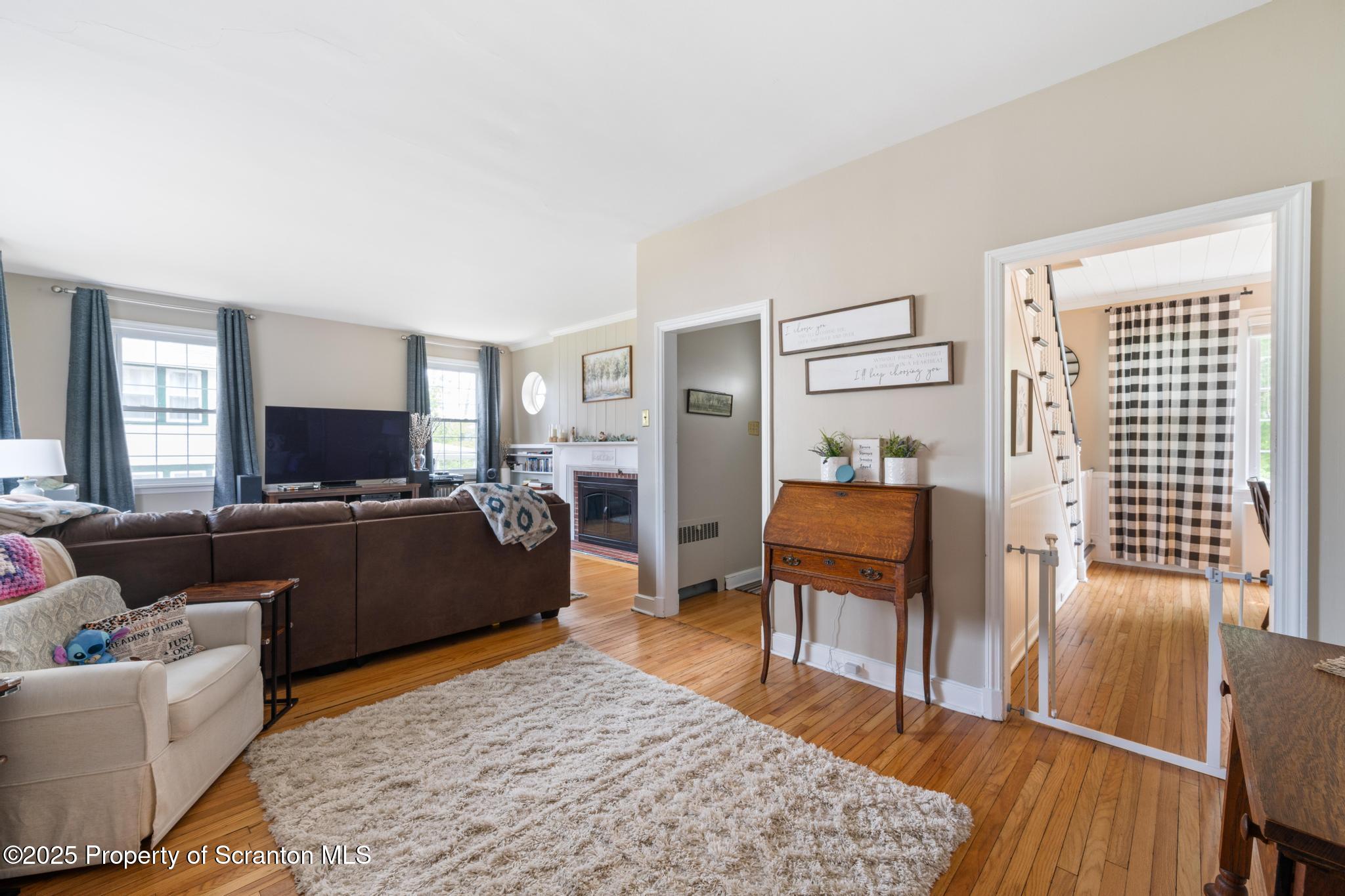 114 Spring Street Clarks Green, PA 18411 - Photo 10 of 47 a living room with furniture and a flat screen tv