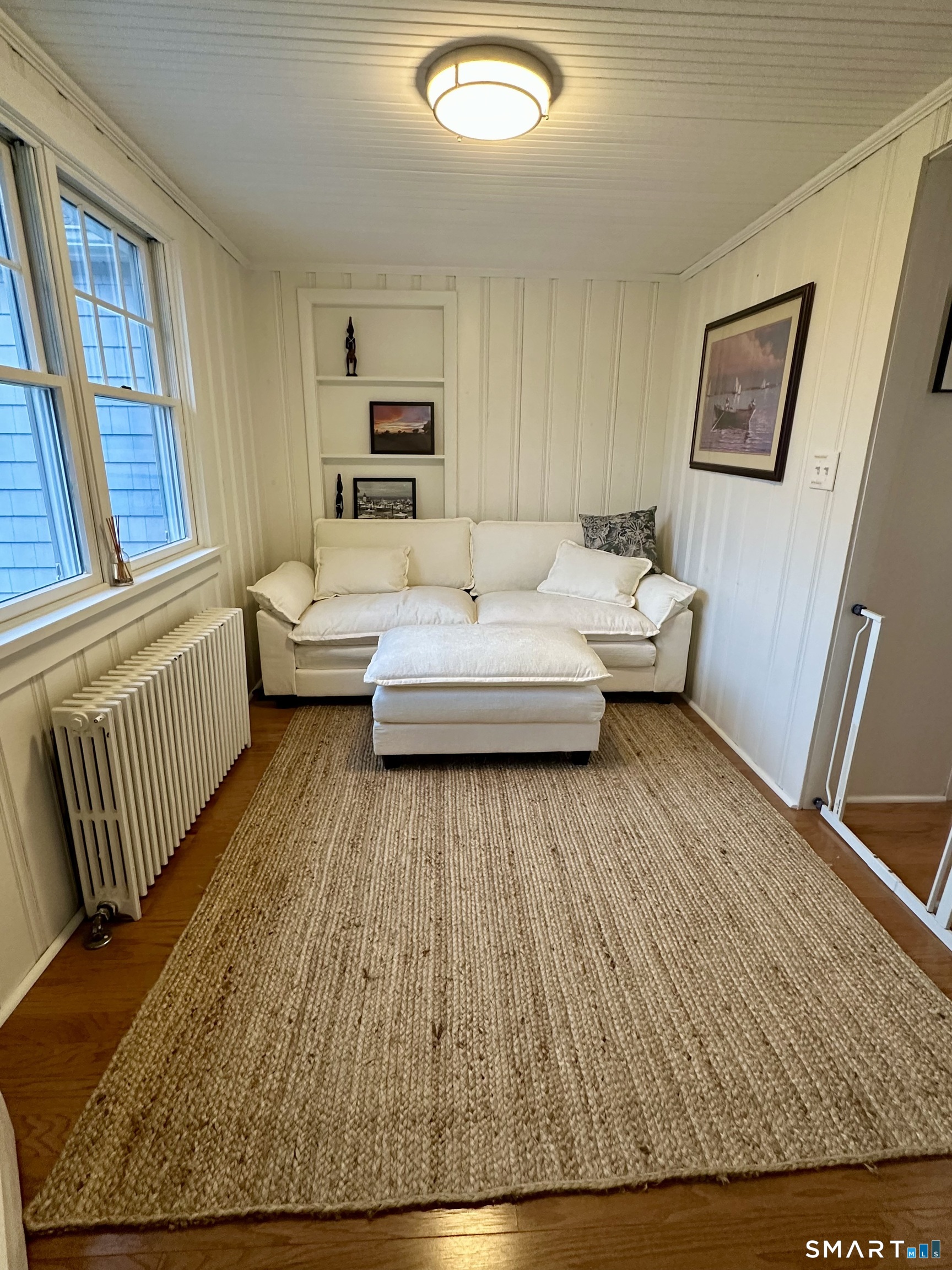 36 Attawan Road East Lyme, CT 06357 - Photo 16 of 40 a living room with furniture and a large window