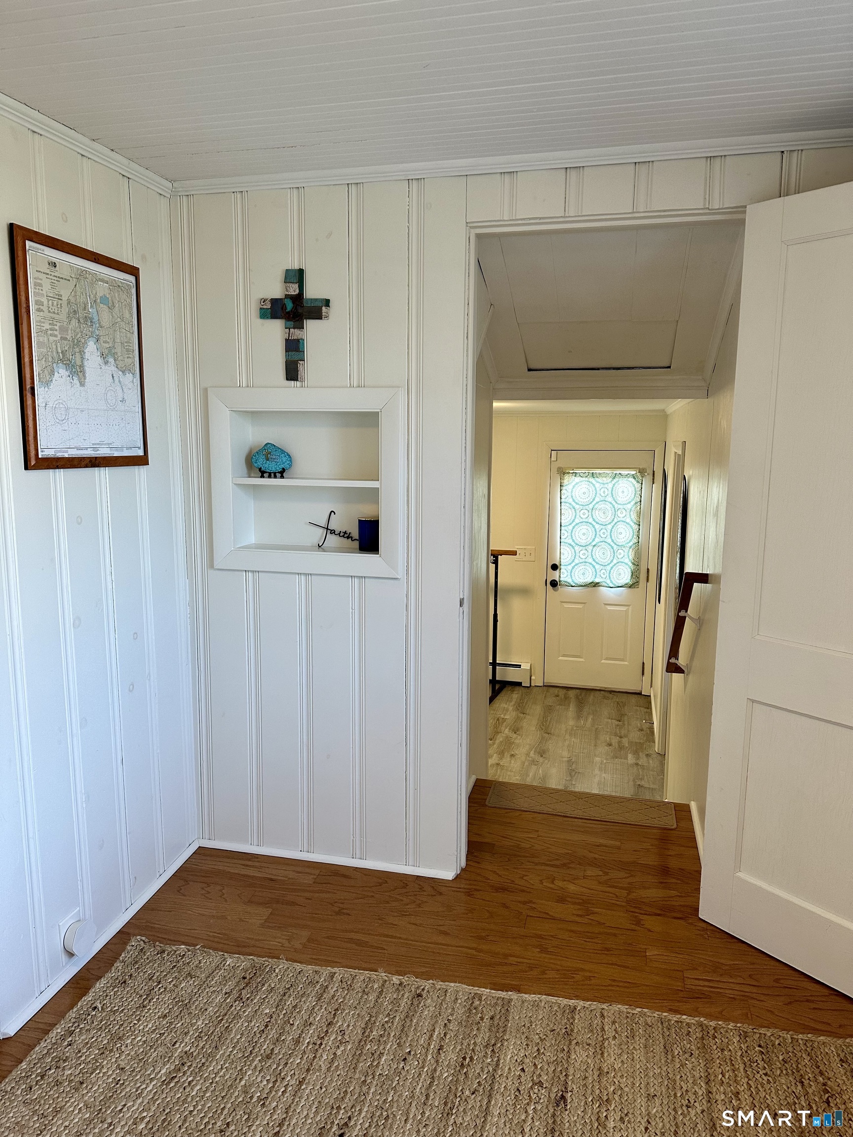 36 Attawan Road East Lyme, CT 06357 - Photo 17 of 40 View from Sitting Room off of the Dining Room. Stairs to Laundry Room and Studio Room with Private Full Bath. Private Entrance.