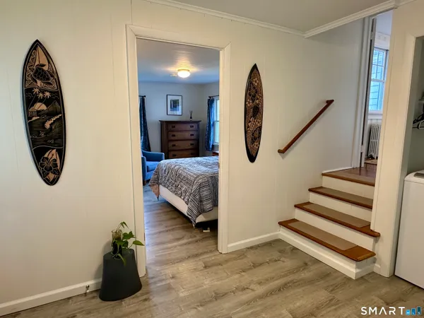 a view of a livingroom with furniture and entryway