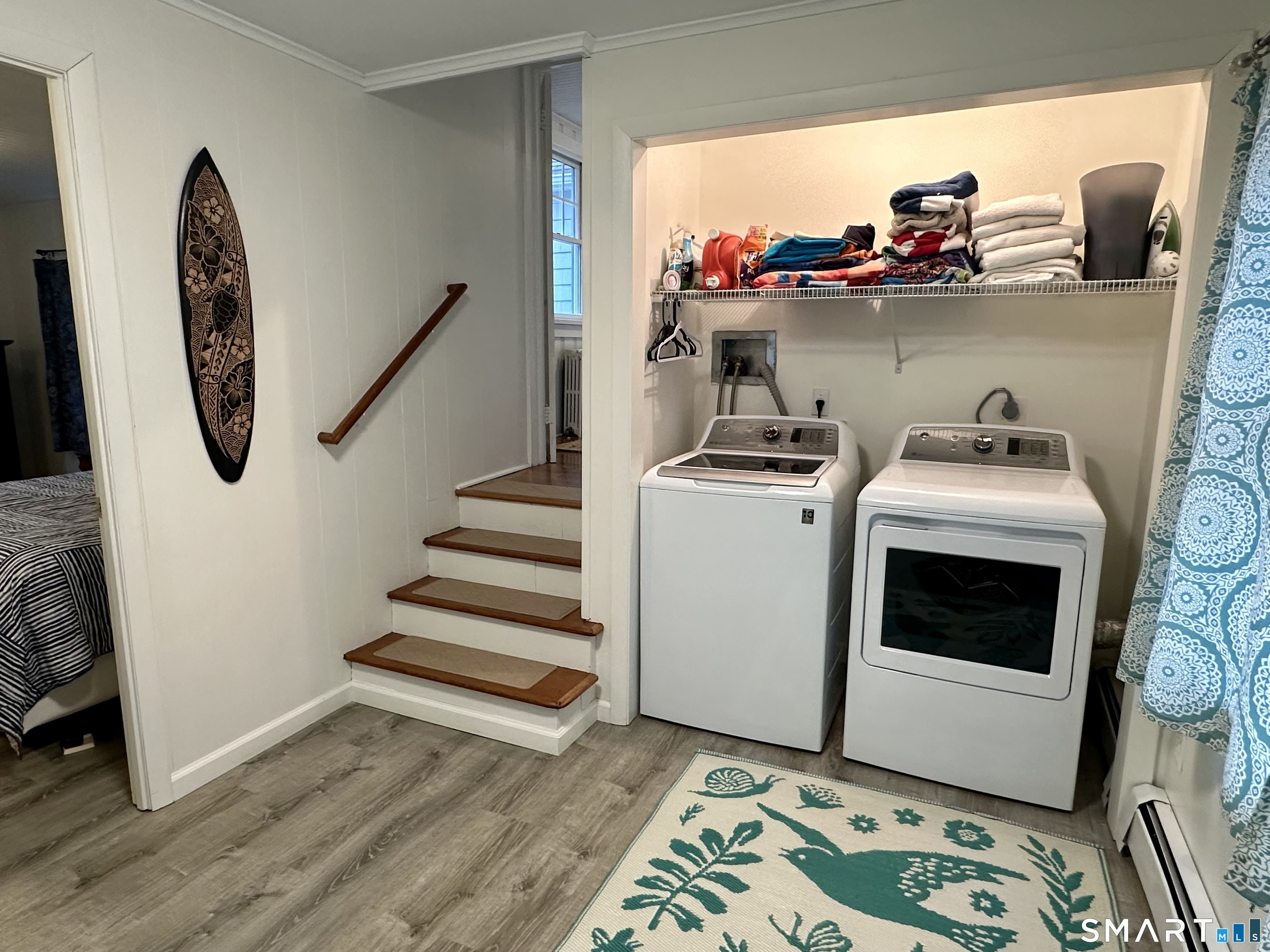 36 Attawan Road East Lyme, CT 06357 - Photo 22 of 40 a view of walk in closet with clothes and shoes