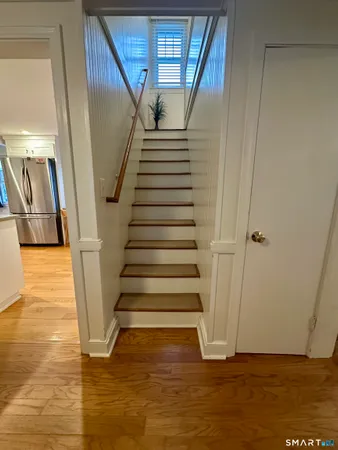 a kitchen with a sink and a refrigerator