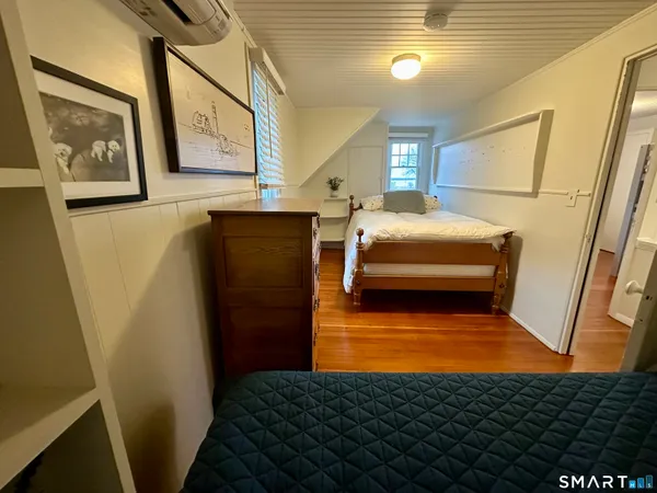 a bathroom with a toilet and a sink