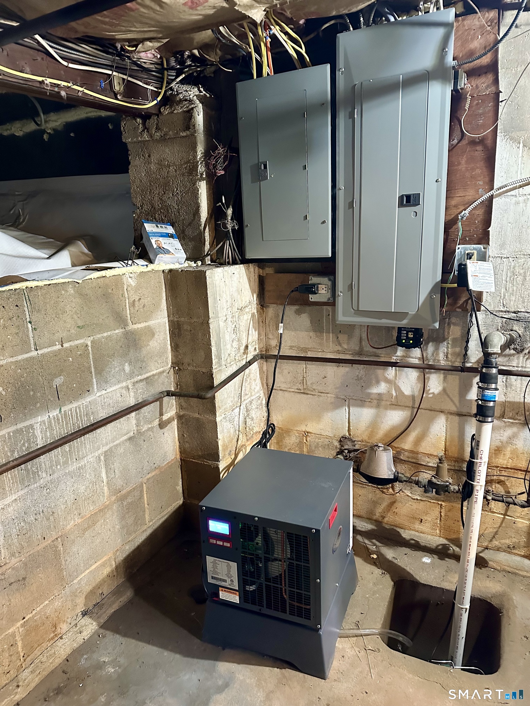 36 Attawan Road East Lyme, CT 06357 - Photo 35 of 40 Dehumidifier and Sump Pump, Electric Panel