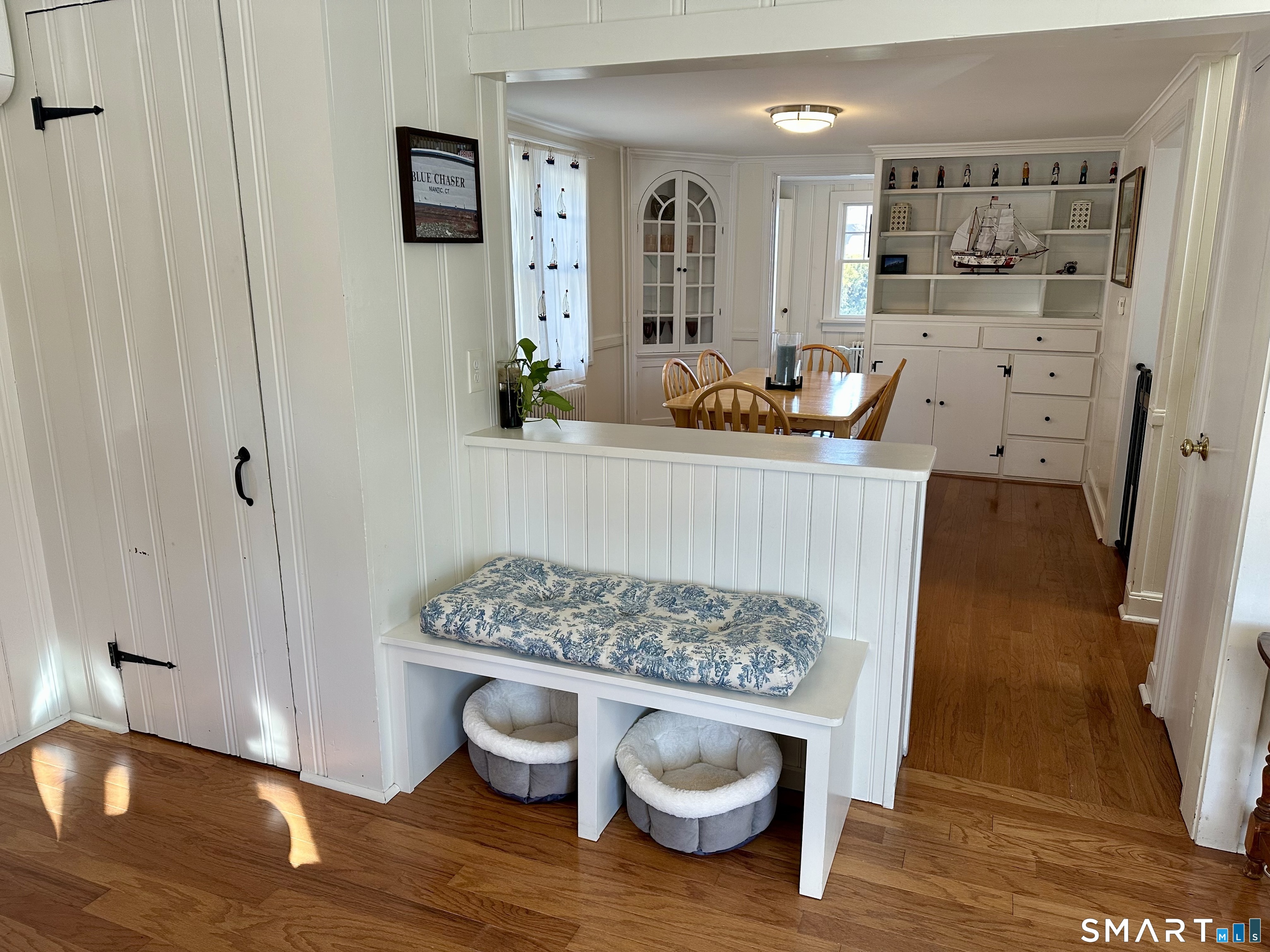 36 Attawan Road East Lyme, CT 06357 - Photo 6 of 40 View from Living Room into Dining Room. Kitchen is first entryway on Right here in photo and sitting room out the back dining room door.
