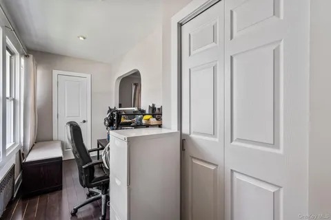 a view of a workspace with furniture