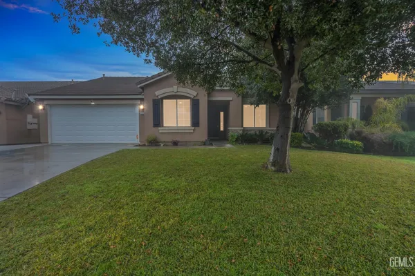 a house view with a garden space