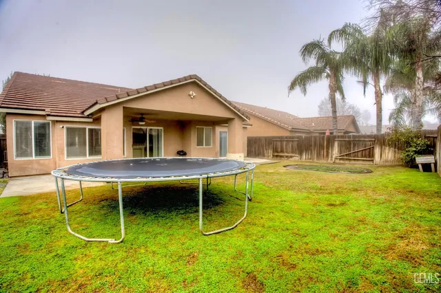 a view of a house with a swimming pool