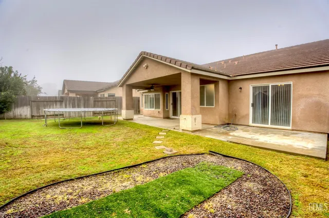 a view of a house with a swimming pool