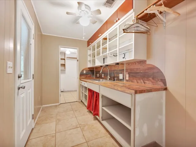 a kitchen with stainless steel appliances granite countertop a stove and a sink