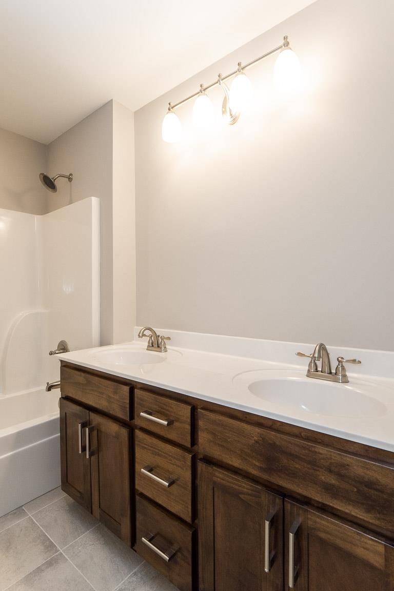 6617 Herbert Shannon Road Springfield, TN 37172 - Photo 28 of 30 a bathroom with a sink and a bathtub