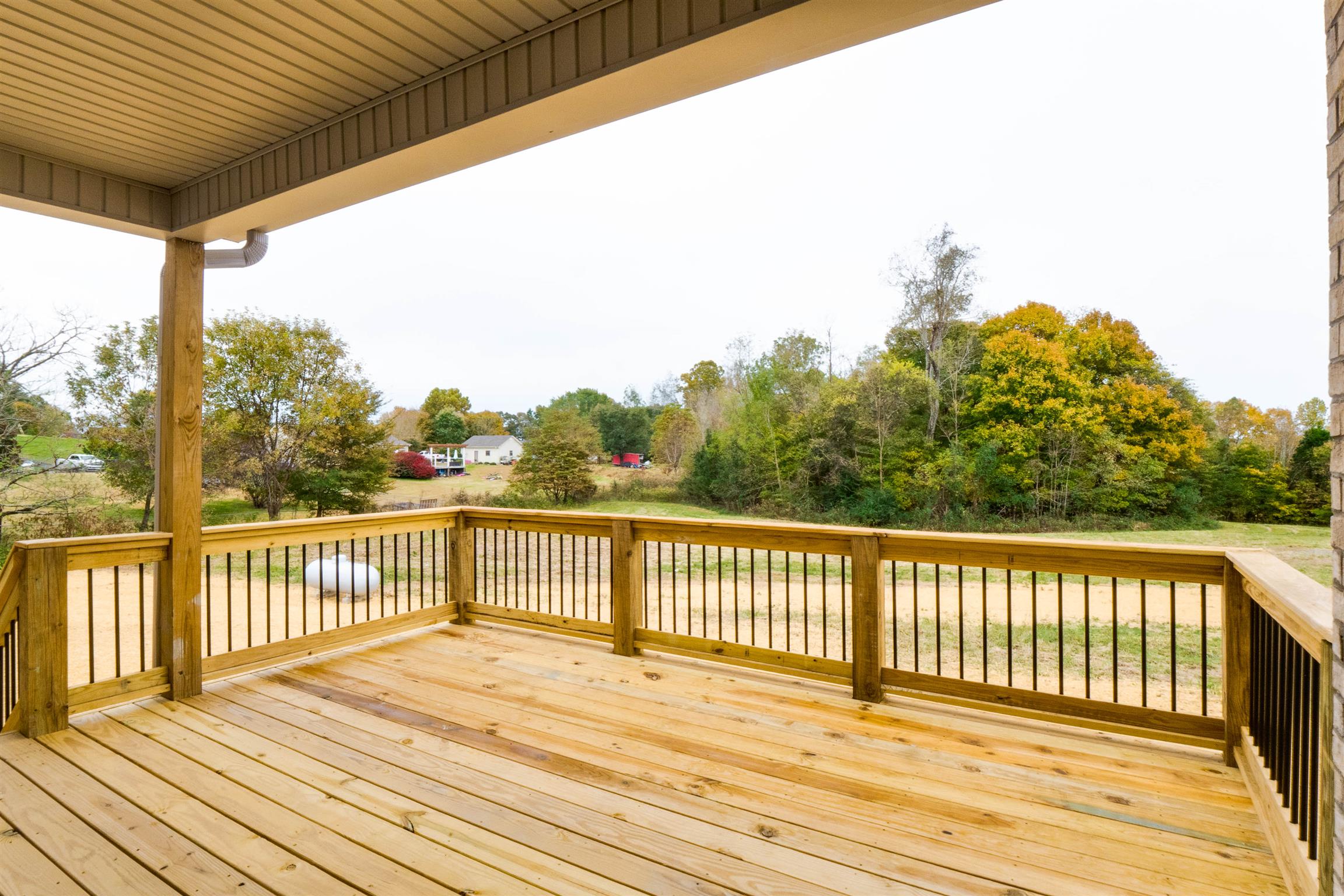 6617 Herbert Shannon Road Springfield, TN 37172 - Photo 6 of 30 a view of a wooden deck