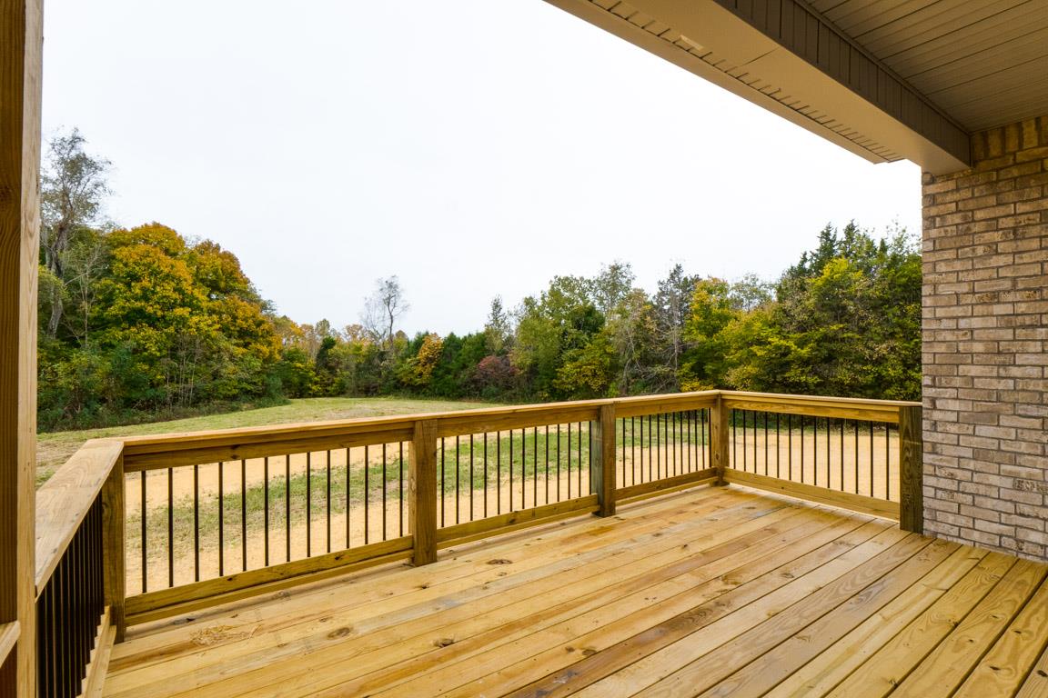 6617 Herbert Shannon Road Springfield, TN 37172 - Photo 7 of 30 a view of balcony with wooden floor and fence