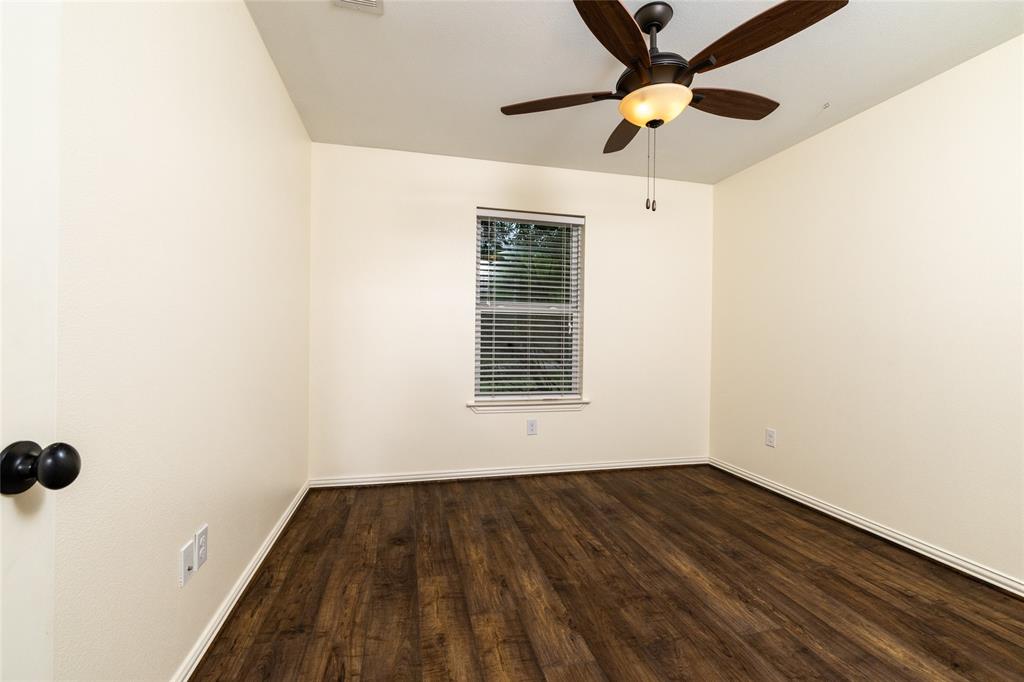 405 Kimbrough Road Azle, TX 76020 - Photo 23 of 39 a view of empty room with wooden floor