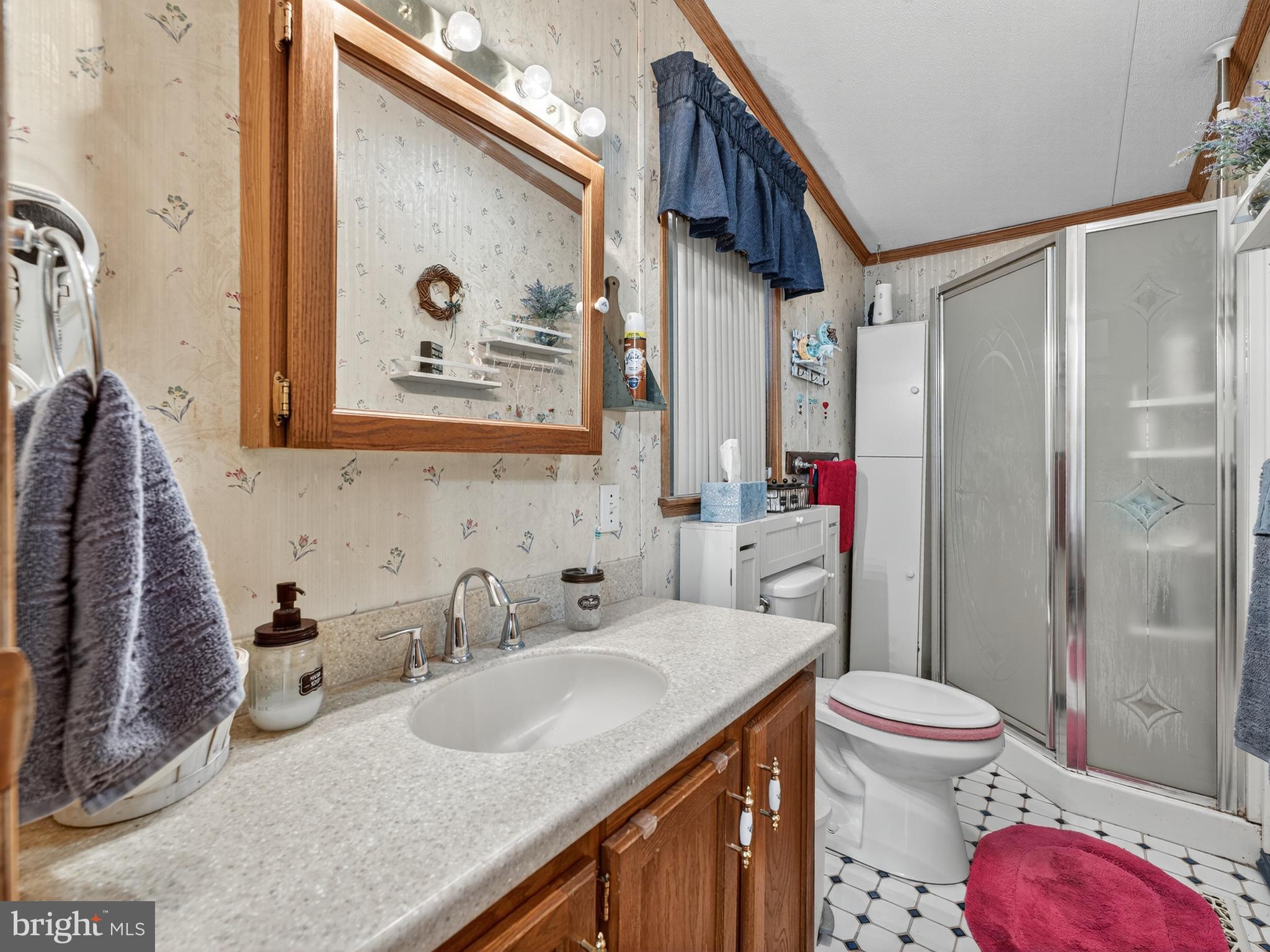885 Cypress Ave Spring Spring City, PA 19475 - Photo 14 of 24 a bathroom with a granite countertop sink and a mirror