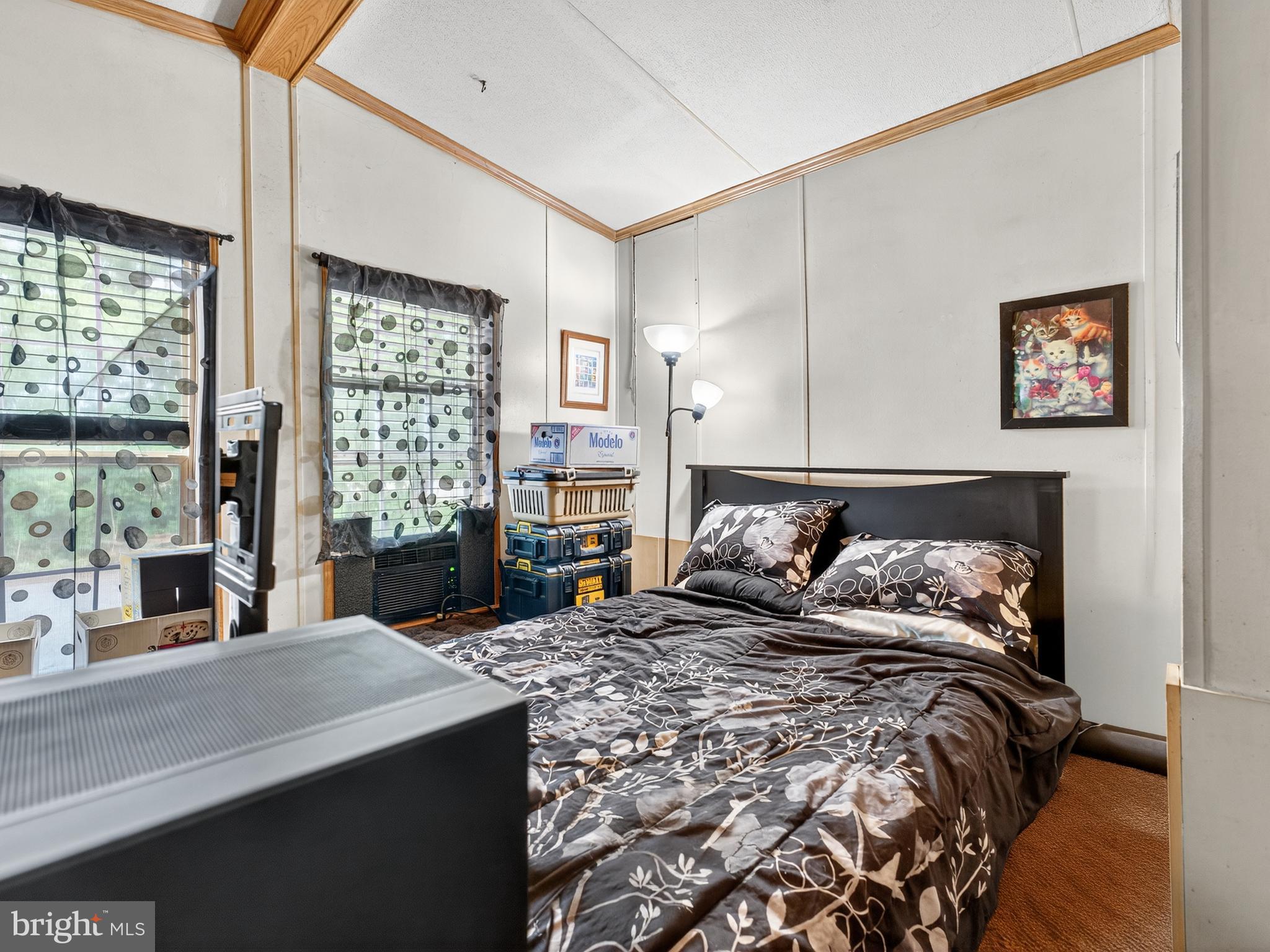 885 Cypress Ave Spring Spring City, PA 19475 - Photo 18 of 24 a bed sitting in a bedroom next to a window