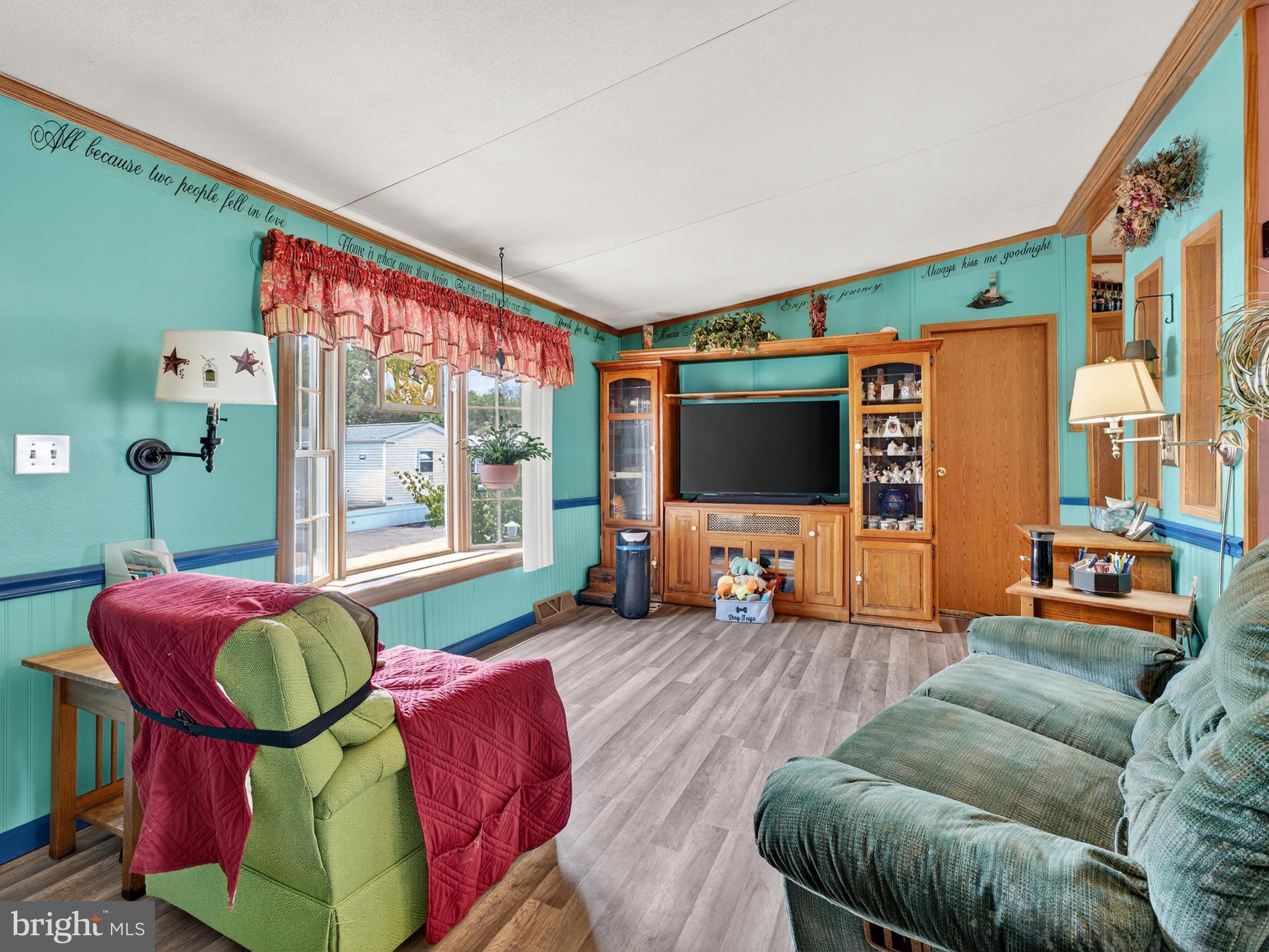 885 Cypress Ave Spring Spring City, PA 19475 - Photo 4 of 24 a living room with furniture and a flat screen tv