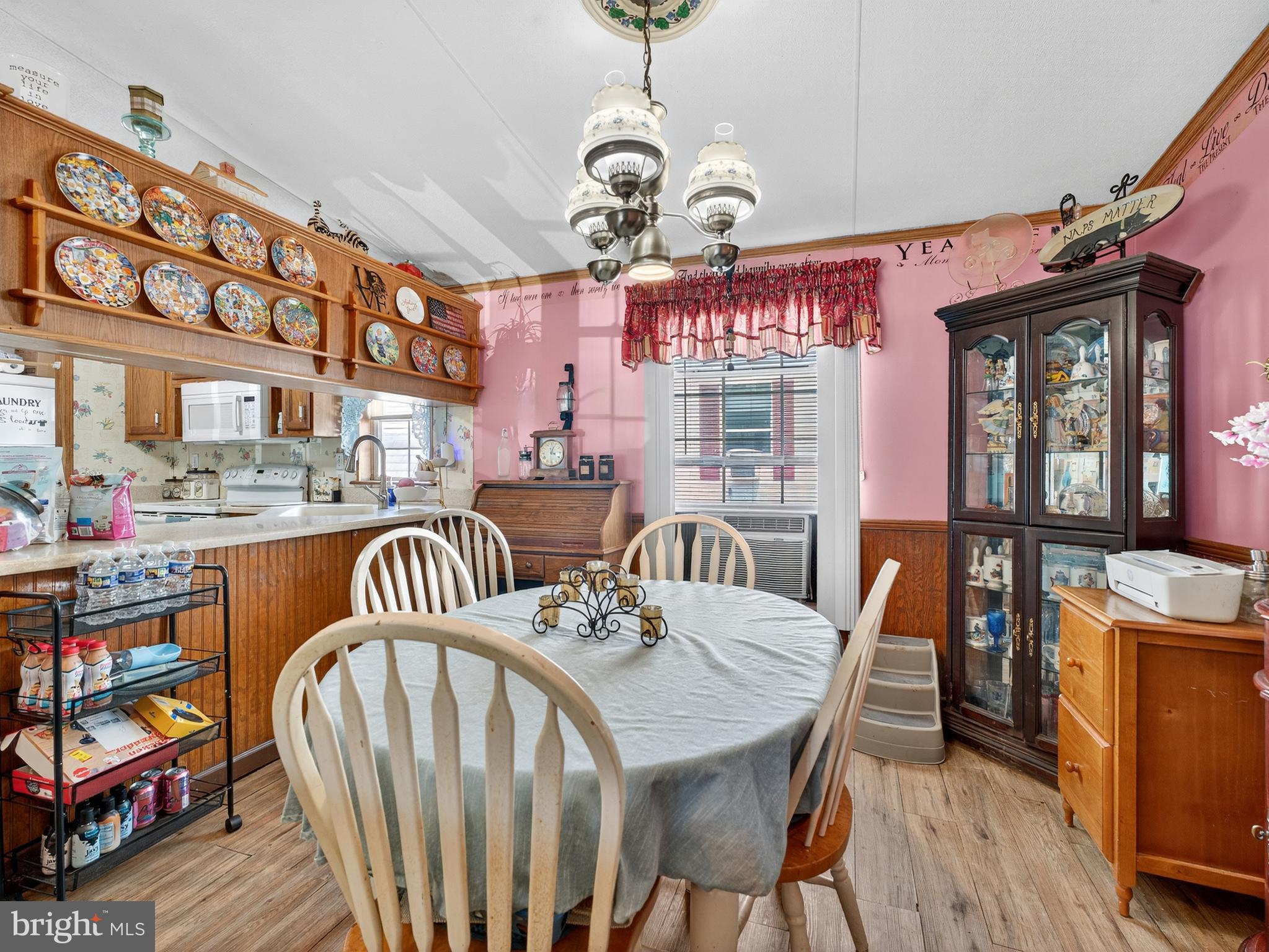 885 Cypress Ave Spring Spring City, PA 19475 - Photo 6 of 24 a dining room with furniture a rug and wooden floor