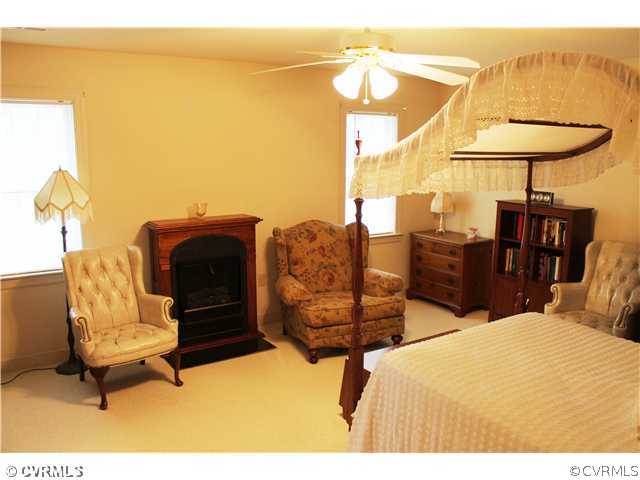 68 Rivers Bend Lane Bumpass, VA 23024 - Photo 14 of 24 Master Bedroom - Another view. The fireplace/heati