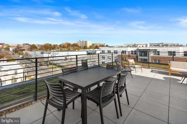 a view of a terrace with outdoor seating