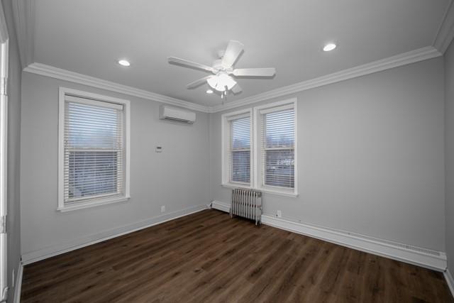 726 Howell Avenue, Unit J Riverhead, NY 11901 - Photo 5 of 8 a view of an empty room with wooden floor and a window