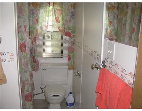 301 Bulgarmarsh Road, Unit T 76 Tiverton, RI 02878 - Photo 8 of 8 a bathroom with a shower