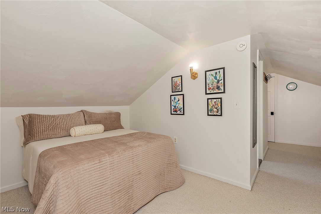 11292 Butternut Road Chardon, OH 44024 - Photo 36 of 49 Carpeted room with a sloped ceiling and white walls