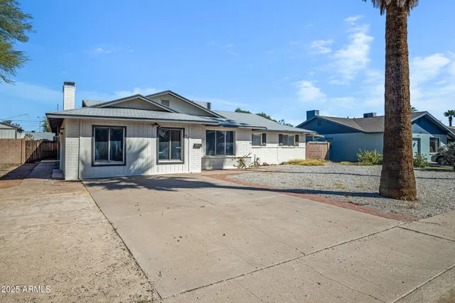 a front view of a house with a porch
