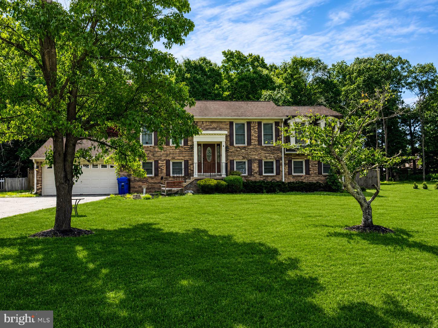 2861 Ridge Road Waldorf, MD 20603 - Photo 2 of 3 Charming brick home on lush green lawn.