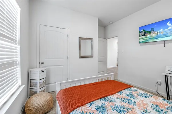 a view of hallway with wooden floor