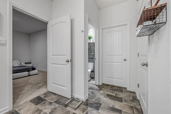 a view of swimming pool with outdoor seating and city view