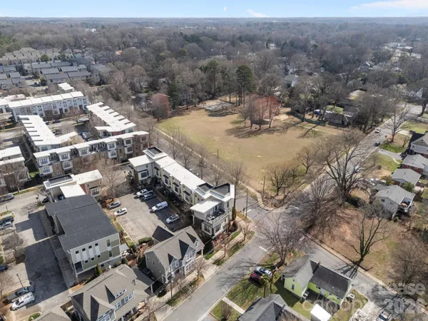 a view of a town with couple of houses