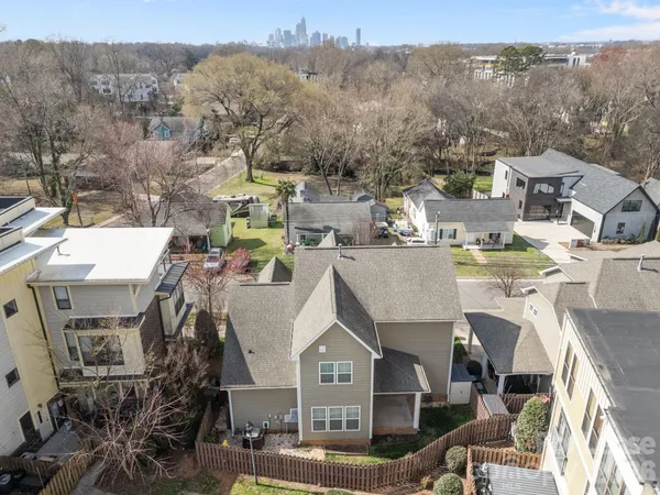 a front view of a house with a small yard