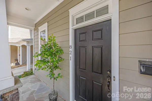 a view of balcony and a potted plant