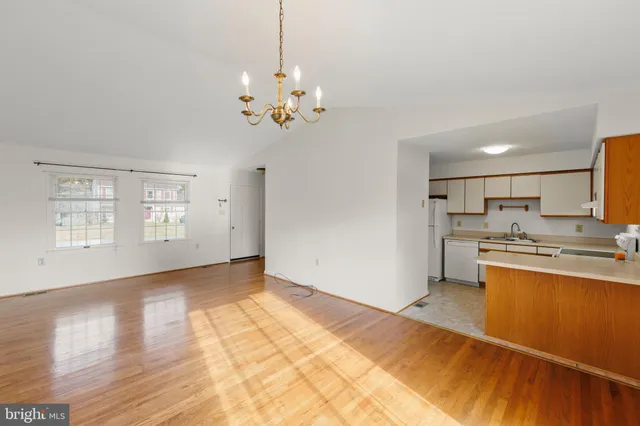 a view of kitchen with sink microwave and stove