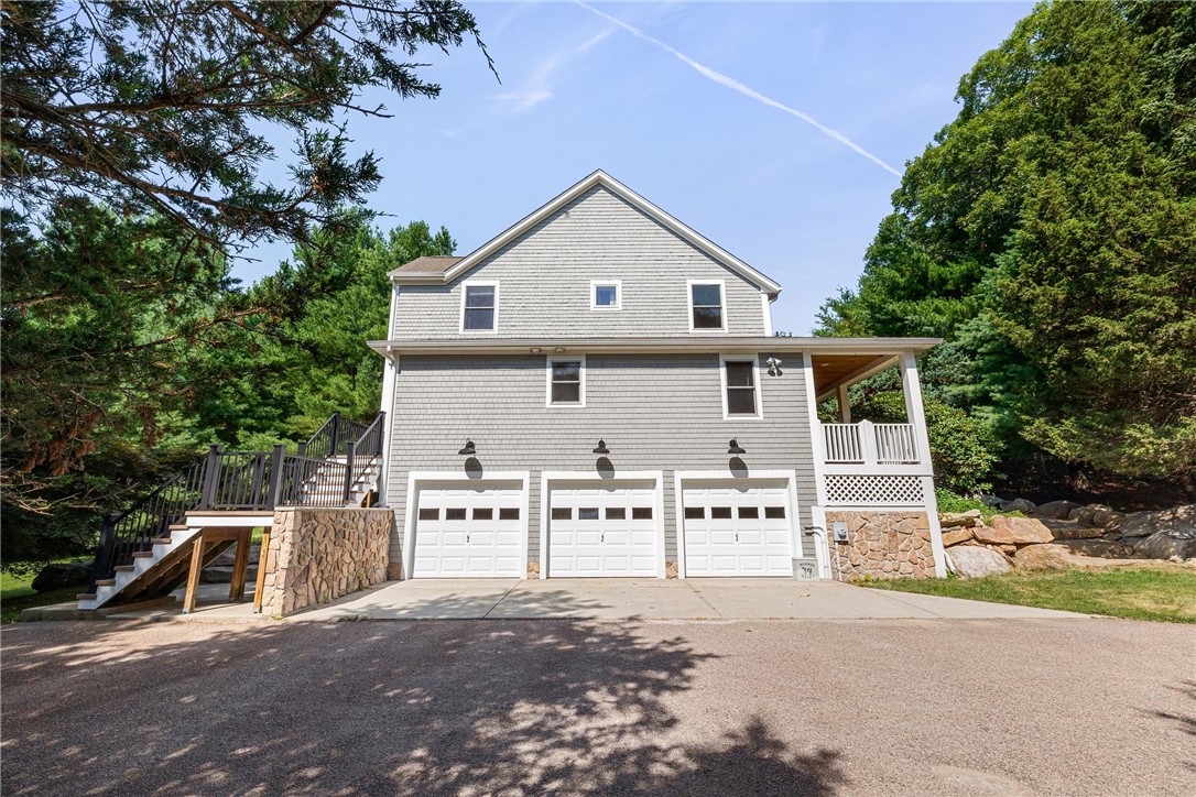 900 S Road East Greenwich, RI 02818 - Photo 5 of 49 Side view, with 3-car garage