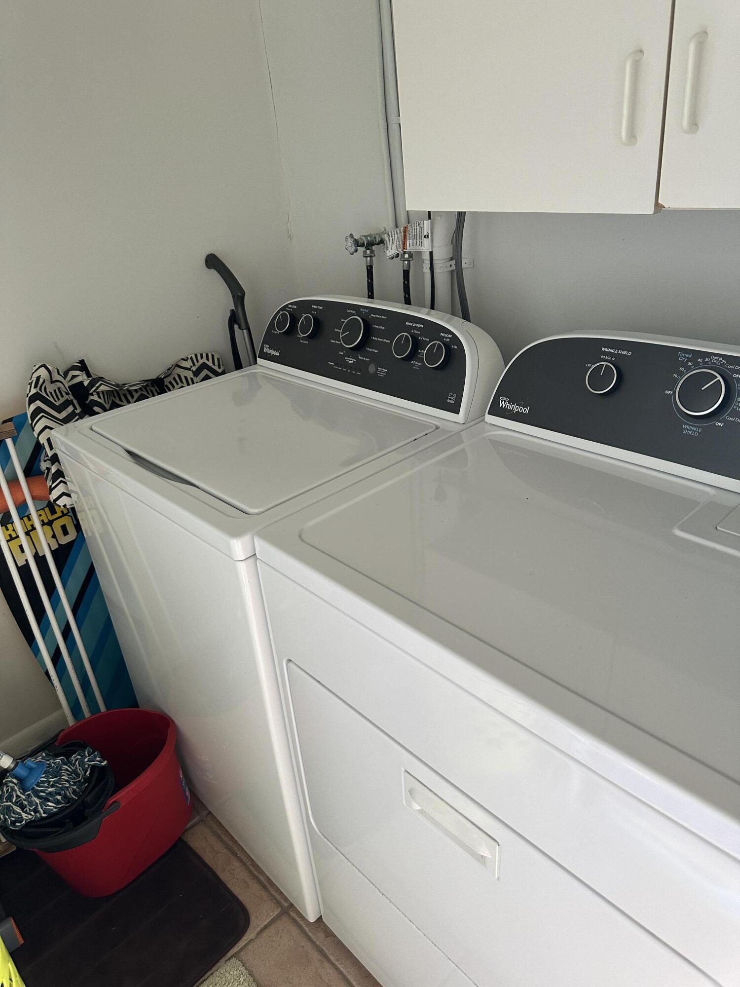 415 Saxony Way Delray Beach, FL 33446 - Photo 15 of 23 a utility room with dryer and washer