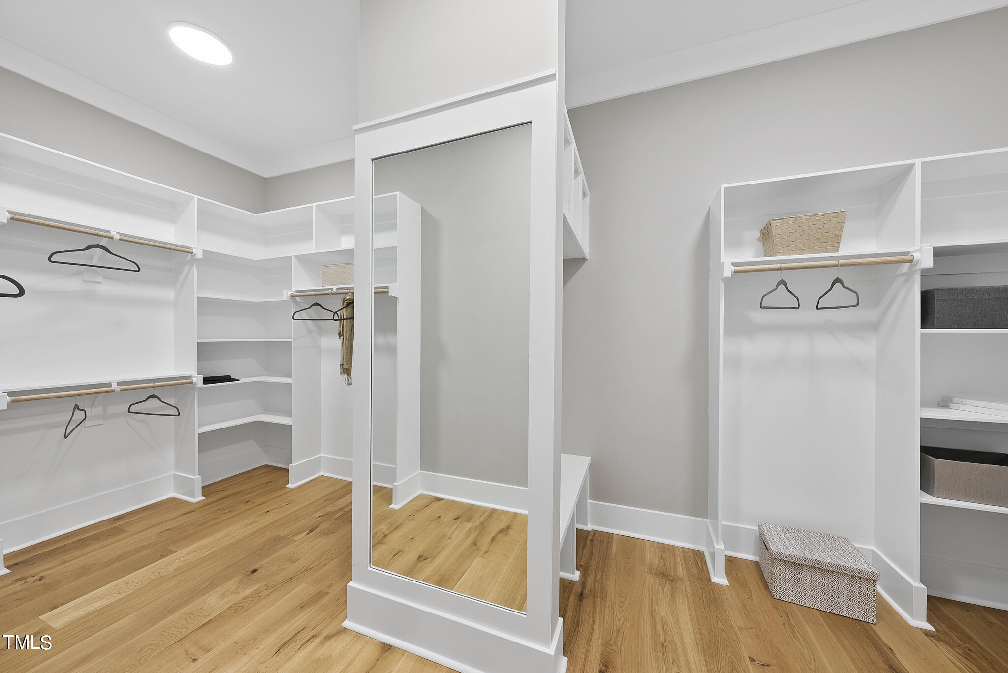 7820 Ailesbury Road Wake Forest, NC 27587 - Photo 13 of 35 a view of walk in closet with empty racks