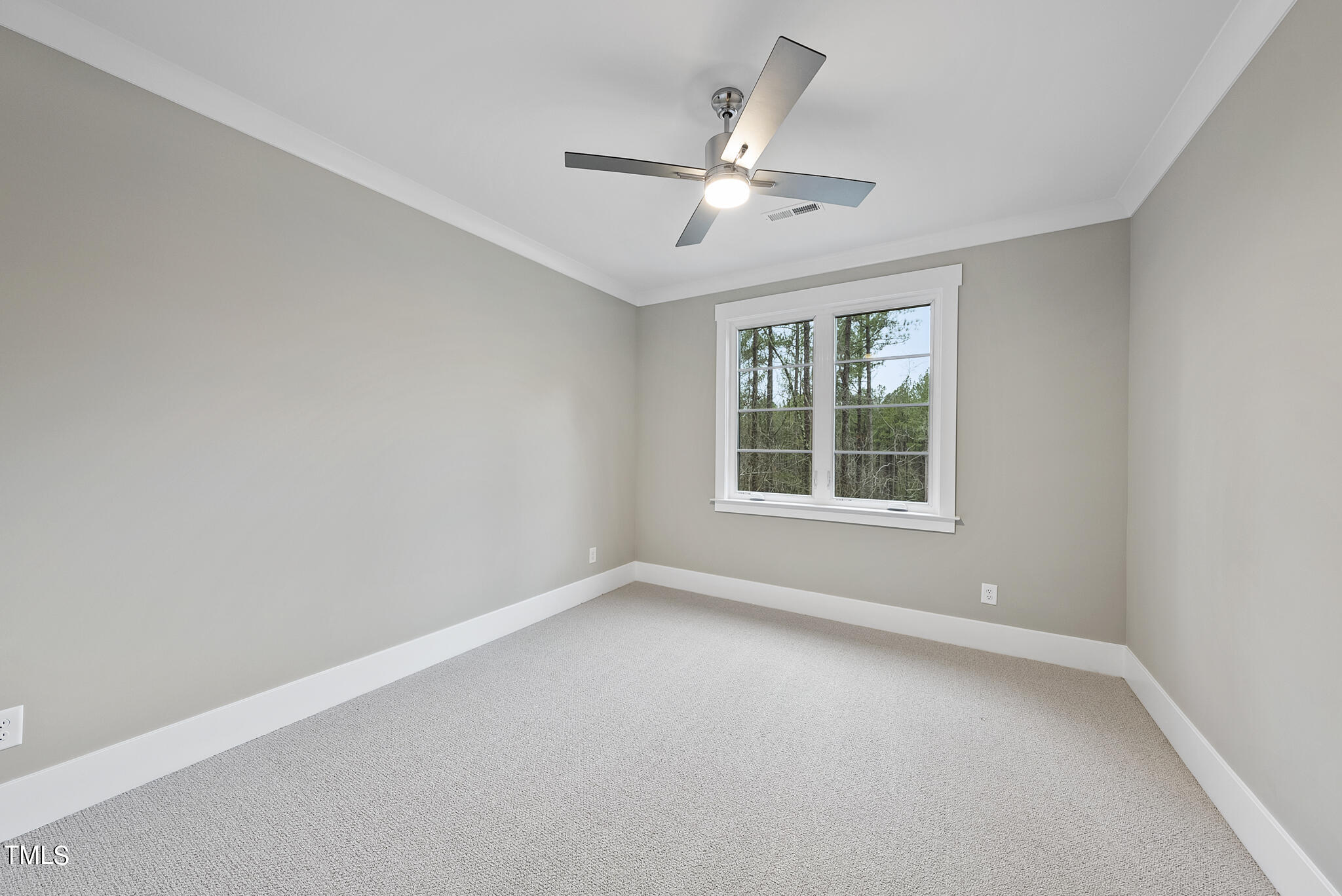 7820 Ailesbury Road Wake Forest, NC 27587 - Photo 16 of 35 a view of an empty room with a window